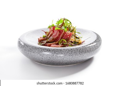 Tataki Tuna Side View. Traditional Japanese Culinary Method. Delicious Fish On Plate. Tasty Sliced Seafood With Greenery And Seasonings. Asian Cuisine, Food Composition. Restaurant Dish