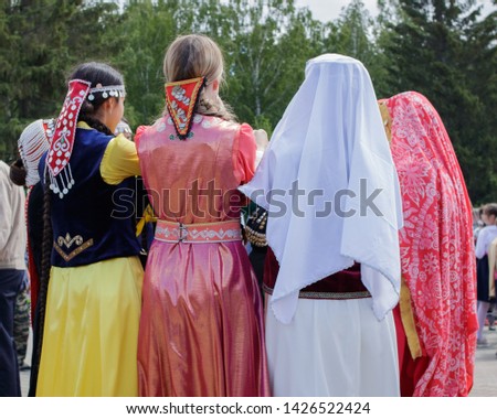 Tatar female traditional vintage headdress. The annual national holiday of the Tatars and Bashkirs Sabantuy in the city park.
