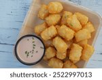 tater tots on a white background