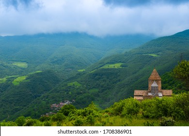 Tatev Orthodox Monastery and the green mountains of Armenia on a summer day
