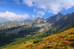Tatra Mountains In Poland. Orla Perc Ridge. September Sunny Day View With Zielony Staw Gasienicowy Lake.