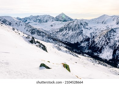 Tatra mountians at winter time. View of the white snow-capped peaks, frosty winter mountains. Kasprowy Wierch, High Tatra, Poland, Europe.