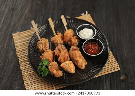 Tatsuta Age, Japanese Style Chicken Karaage with Bamboo Stick, Served with Mayonnaise and Tomato Sauce 