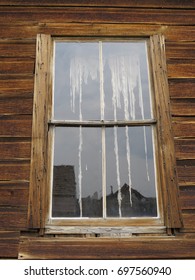 Tattered Curtain In Abandoned Home