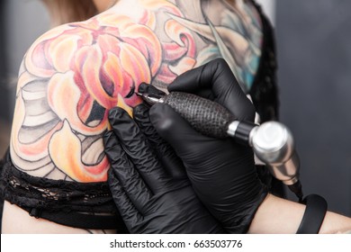 Tattoo Artist In A Studio