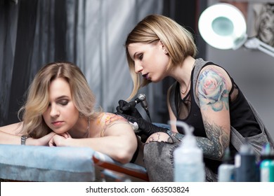 Tattoo Artist In A Studio