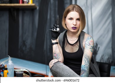 Tattoo Artist In A Studio