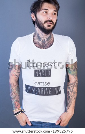 tattoo man with funny t-shirt 