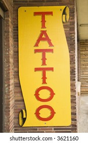 Tattoo Sign Outside Of Tattoo Parlor.