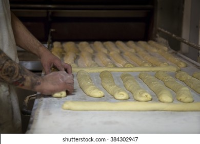 Tattooed French Baker Preparing Bread