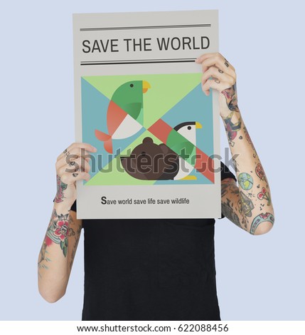 Tattooed woman with save the animals banner