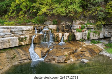Taughannock Falls drops through a dramatic gorge surrounded by cliffs and forest in the Finger Lakes region of New York