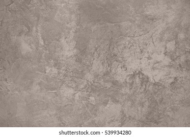 Taupe Abstract Grungy Decorative Texture. Rough Old Stucco Wall Vintage style Background. Handmade Sepia Beige Paper With Copy Space
