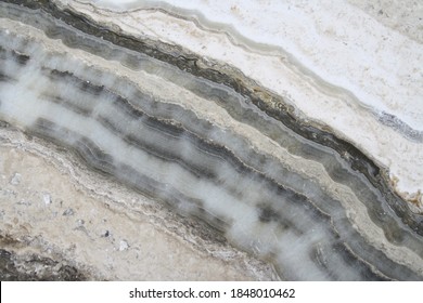 Taupe color marble with uneven lines texture
