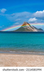 Tavolara Island, Scenic View Of Island And Full Rainbow In A Unique Moment