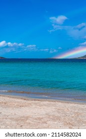 Tavolara Island, Scenic View Of Island And Full Rainbow In A Unique Moment