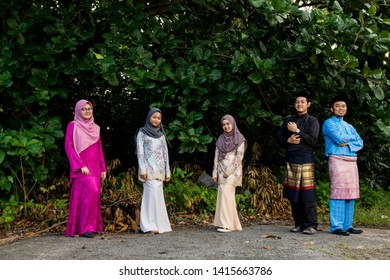 TAWAU,SABAH,MALAYSIA-May 26,2018: A few man and women dress for eid fitr or called as hari raya aidilfiri - Shutterstock ID 1415663786