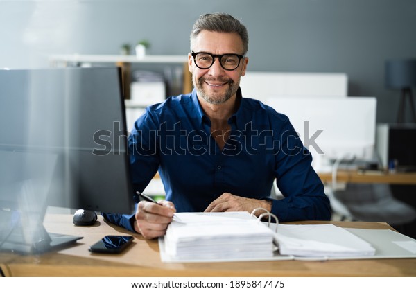 Tax\
Accountant Advisor Man Doing Sales Invoice\
Accounting