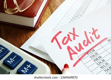 Tax Audit Handwriting On Business Accounting Documents.