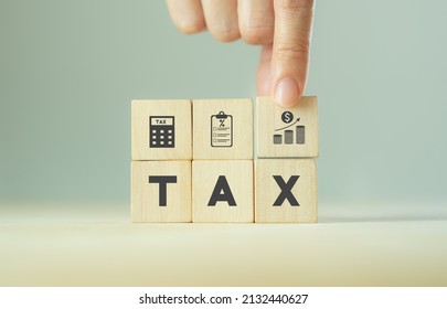TAX concept, on wooden block  including of State taxes,Tax payment, Governant ,calculating finance, tax accounting, statistics and data analytic reserach, calculation tax return, strategy plan, report - Shutterstock ID 2132440627