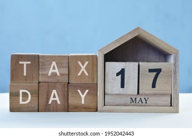 Tax Day Concept With Wooden Calendar 17 May And Cube