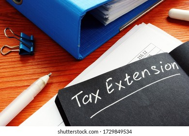 Tax Extension Sign On The Black Sheet.