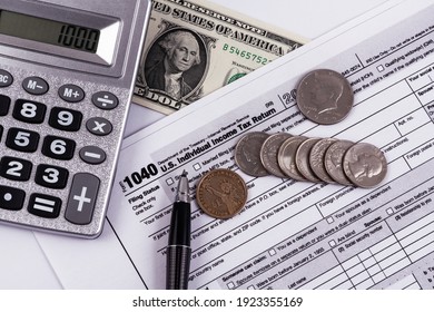 Tax Form 1040, Calculator, Pen, Money