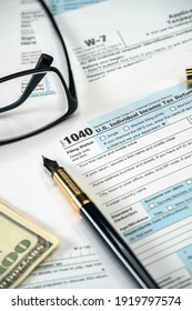 Tax form USA business income office concept. Tax Return Form 1040. Vertical photo