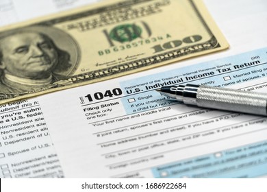 Tax forms 1040. U.S Individual Income Tax Return. Tax time. - Shutterstock ID 1686922684