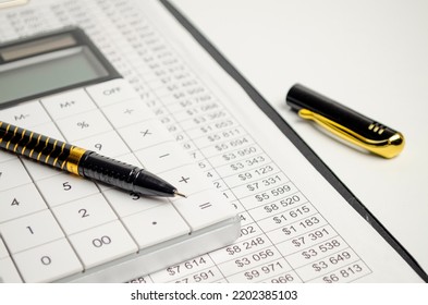 Tax Forms, Spread Sheet With Pen And Calculator.