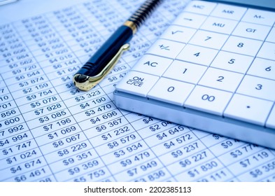 Tax Forms, Spread Sheet With Pen And Calculator.