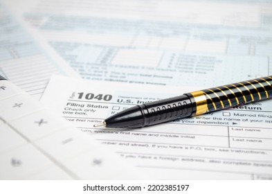 Tax Forms, Spread Sheet With Pen And Calculator.