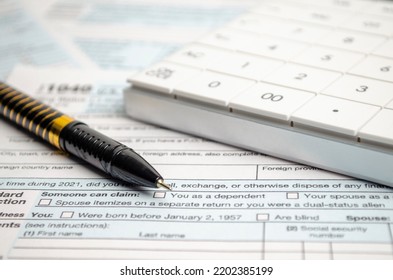 Tax Forms, Spread Sheet With Pen And Calculator.