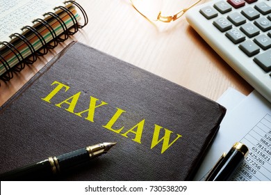 Tax Law On A Table. Taxation Concept.