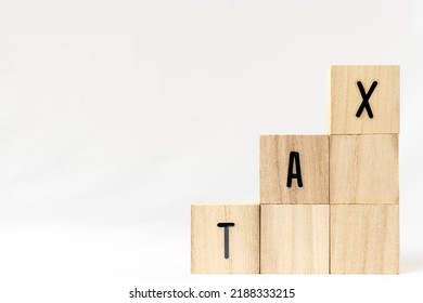 Tax On Wooden Blocks. Image Of Tax Increase