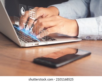 Tax payment and Calculation tax return concept. Businessman using a laptop to complete Individual income tax return form online for tax payment. Taxes paid by individuals and corporations
