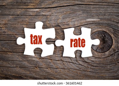 Tax Rate - words on puzzle. Business conceptual