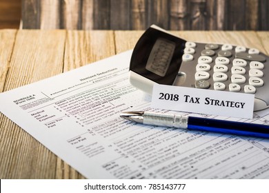 Tax reform concept for 2018 with tax preparation forms for property, itemized and mortgage interest deductions