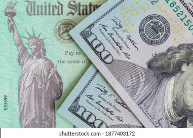 Tax Refund Check with Hundred Dollar Bills. - Shutterstock ID 1877403172