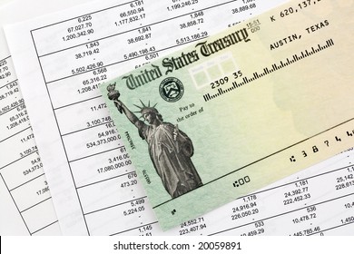 Tax refund check on top of Financial Statements