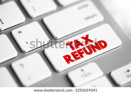 Tax Refund - payment to the taxpayer when the taxpayer pays more tax than they owe, text concept button on keyboard