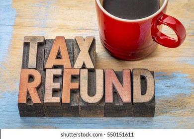 tax refund - word abstract in vintage letterpress wood type blocks with a cup of coffee