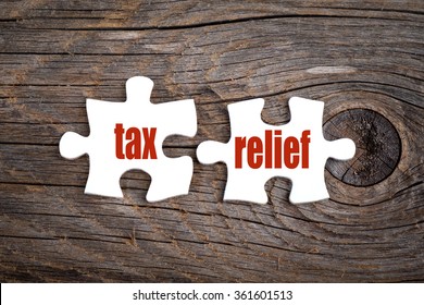 Tax Relief - Words On Puzzle. Business Conceptual