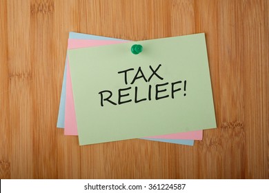 Tax Relief! Written On Green Paper Note