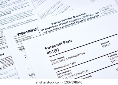 Tax reporting and retirement plan. Personal plan 401k form on against background 5304-simple tax form and other forms