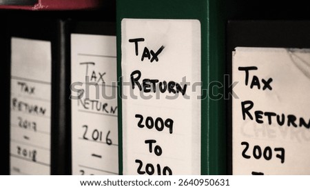 Tax return folder documents grouped by year.
