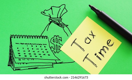 Tax Time Is Shown On A Photo Using The Text