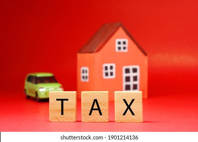 Tax Word On Blur Home And Car Vehicle Background - Red Pattern Of Business And Planning Cost Investment Concept - Calculate Reduce Taxes Or Taxes Back And Return 