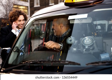 Taxi Cab Driver Communicating Male Passenger Stock Photo 136554449 ...