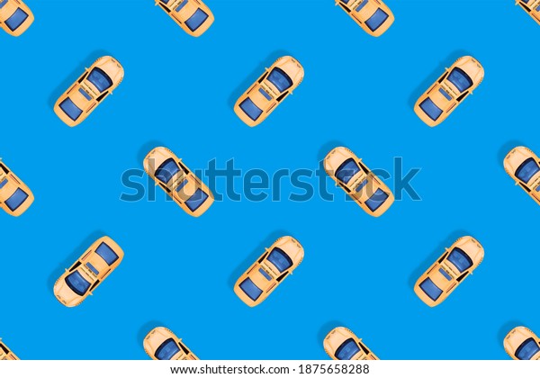 Taxi
car top view. Seamless pattern on the theme of
taxi.